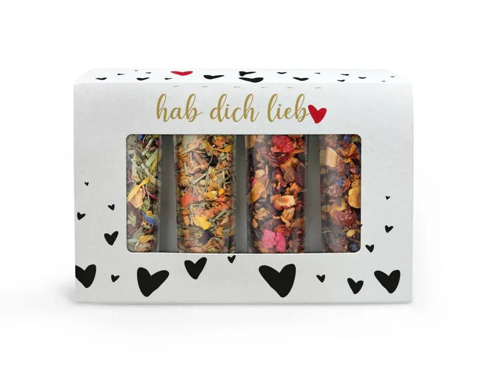 Geschenkbox mit vier Röhrchen bunter Gewürzmischungen, Aufschrift 'hab dich lieb', feinkostgourmet